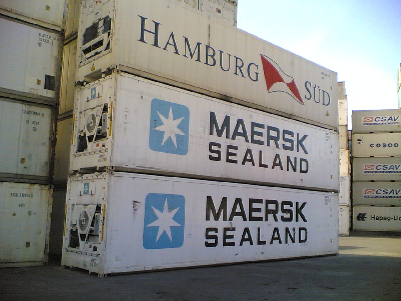 Stacked refrigerated shipping containers used for temperature-controlled freight