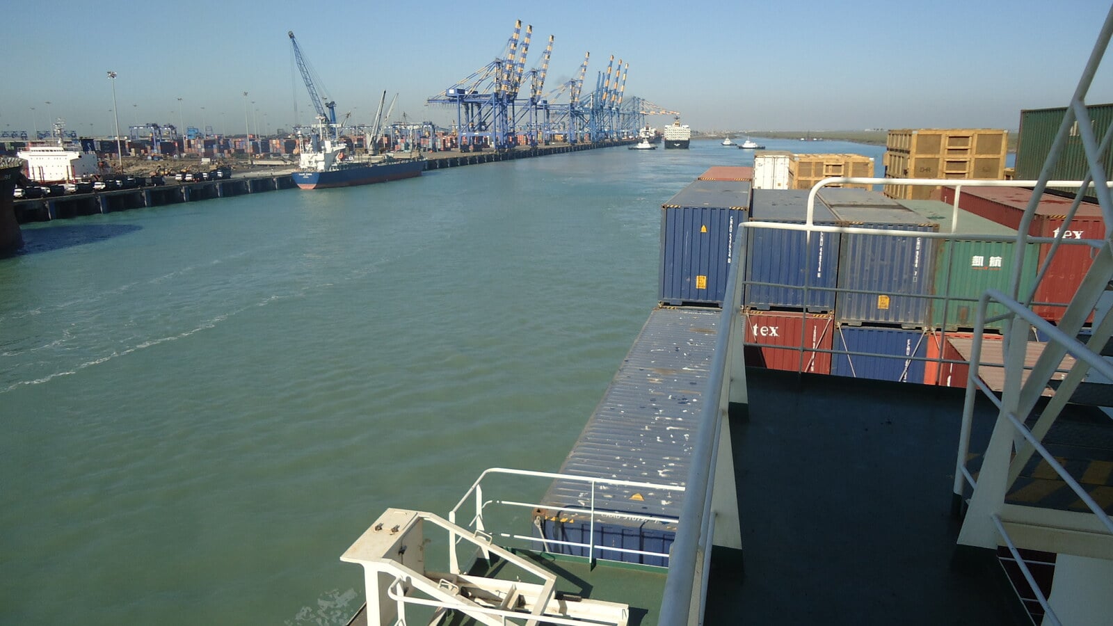 Container ships, cranes and stacked containers at Mundra Port in Gujarat, India